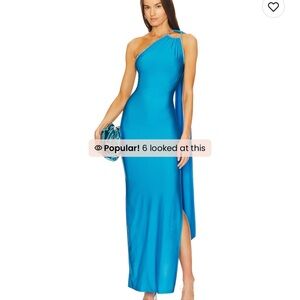 Revolve One Shoulder Cut Out Gown in Blue
Khanums